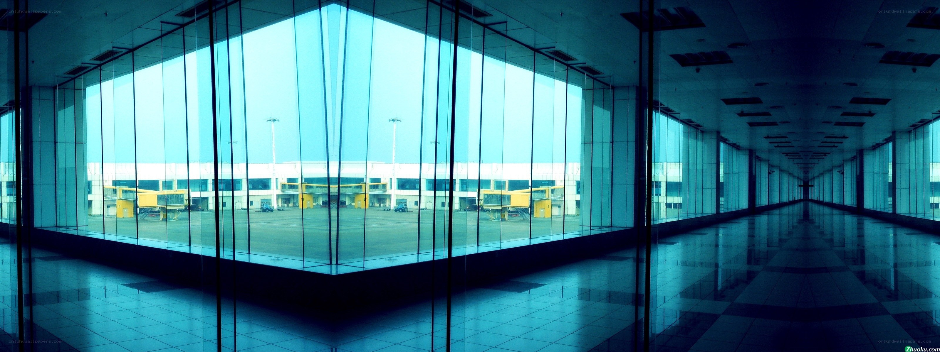 Empty airport terminal hallway