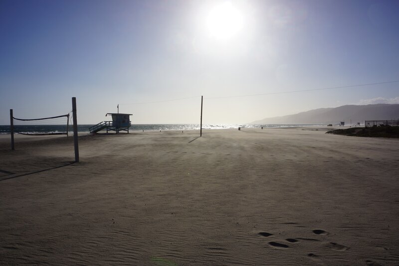 Empty beach with lifeguard tower
