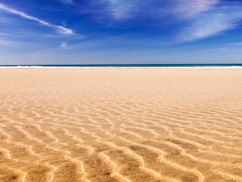 Empty beach with rippled sand