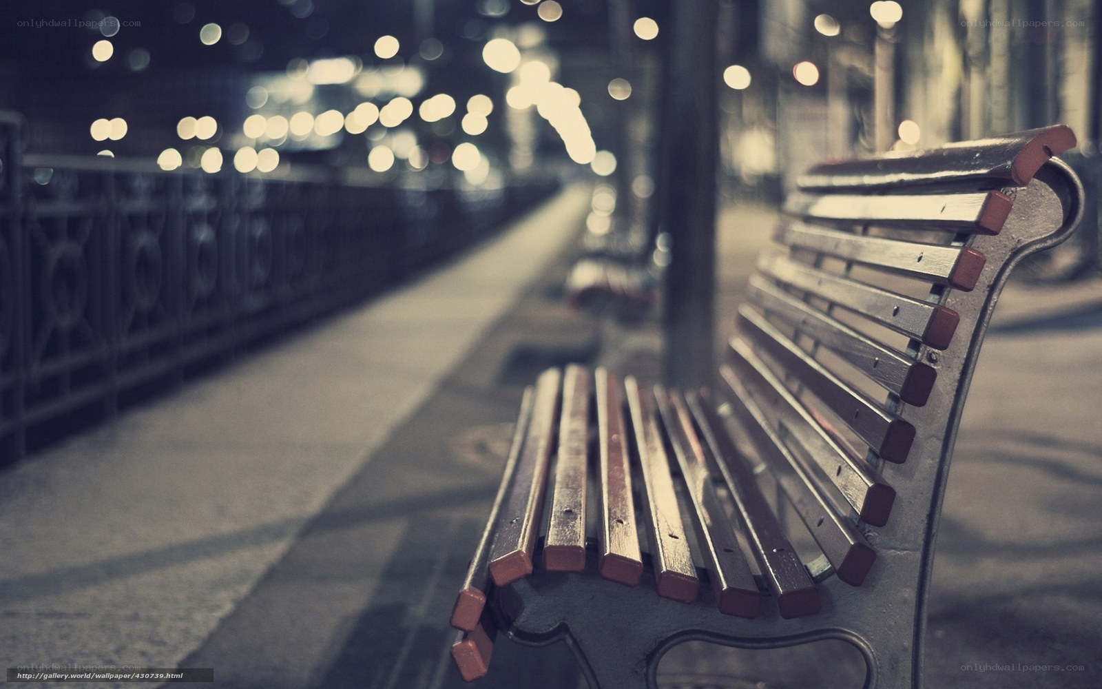 Empty bench at night