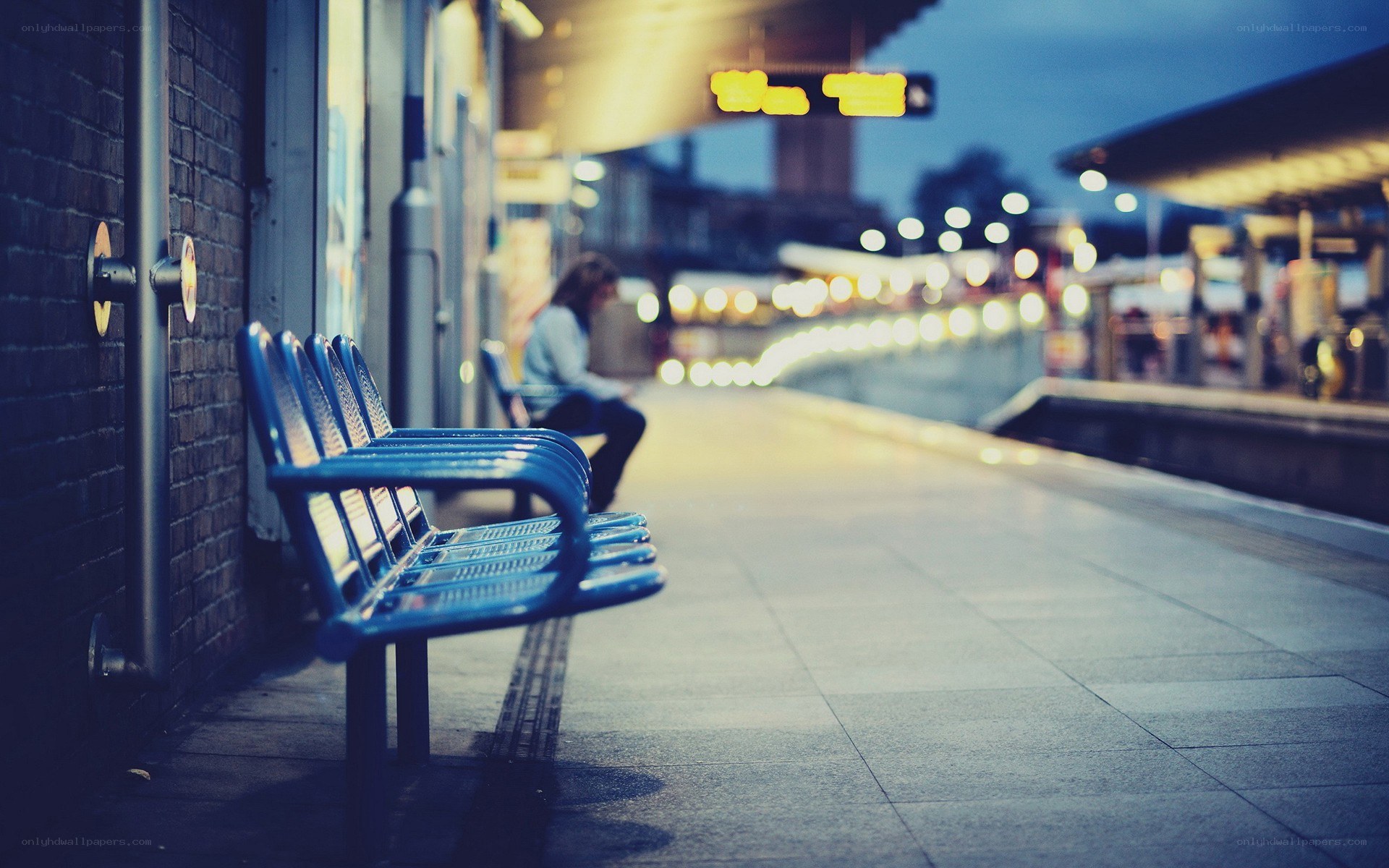Empty bench at train station