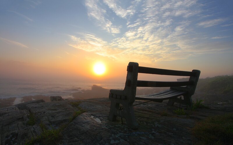 Empty Bench on Cliff — Blue