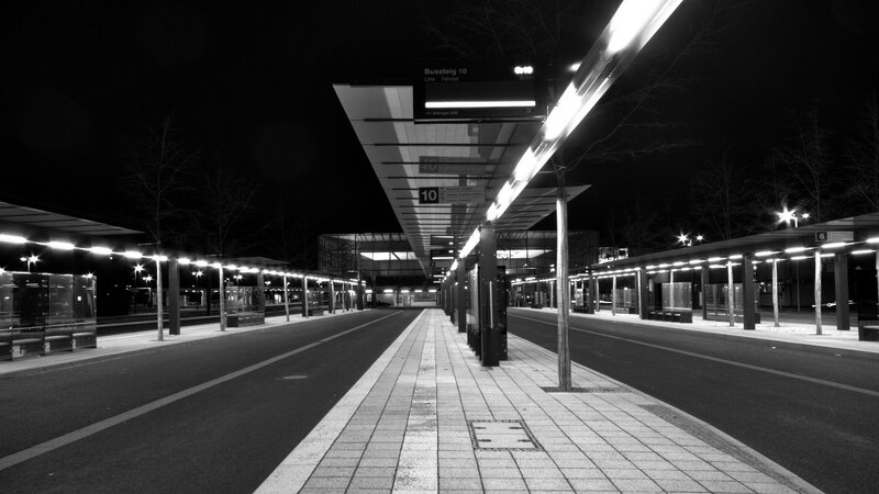 Empty Bus Station at Night — Black, Desolate