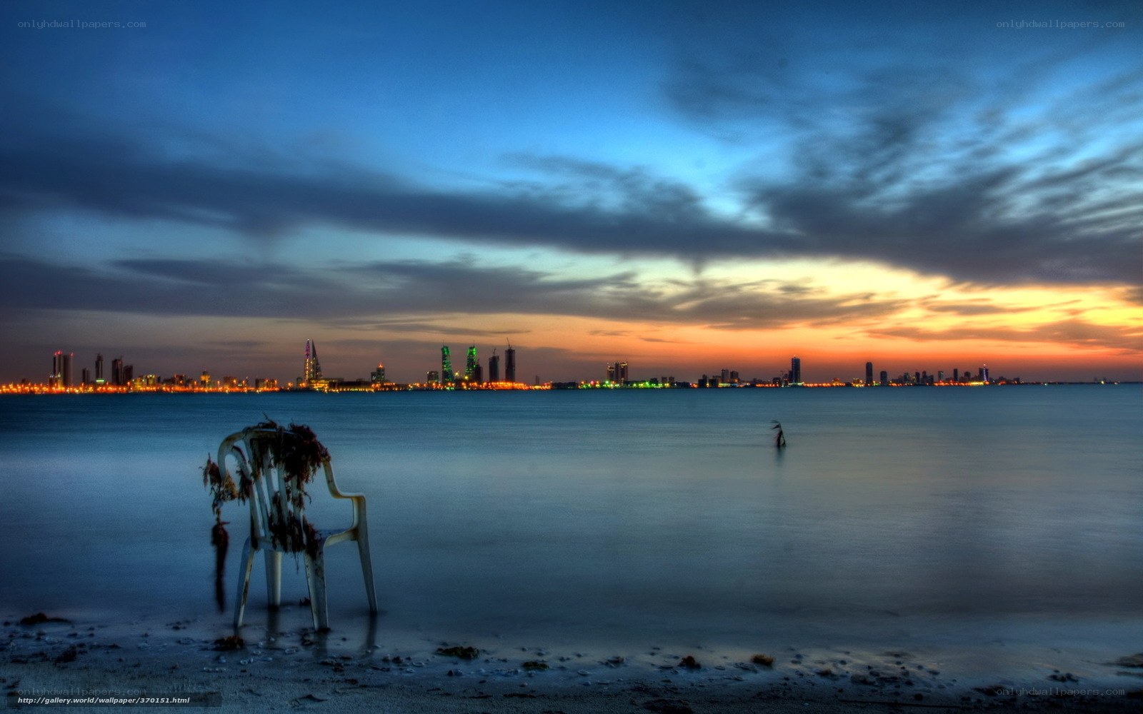 Empty chair at sunset