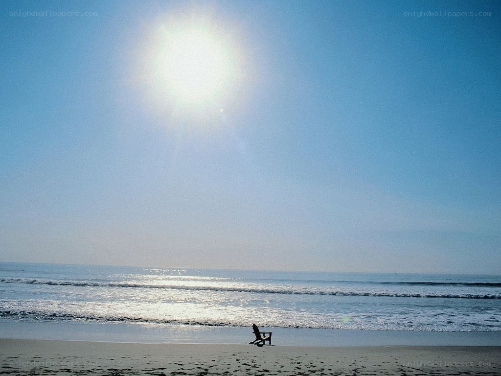 Empty chair on a sunny beach