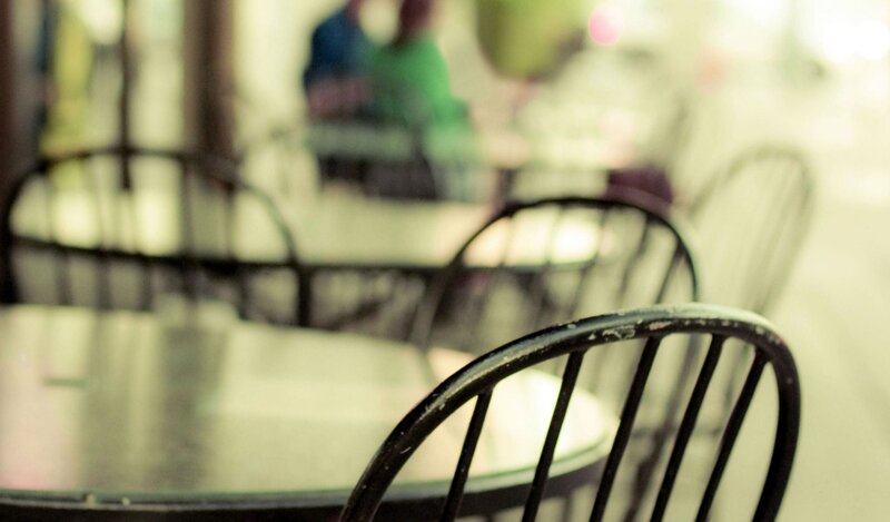 Empty chairs at a cafe
