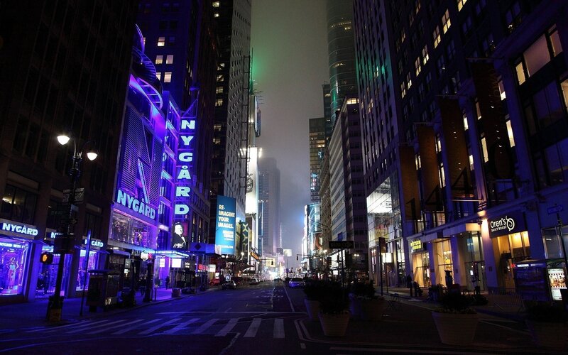 Empty city street at night