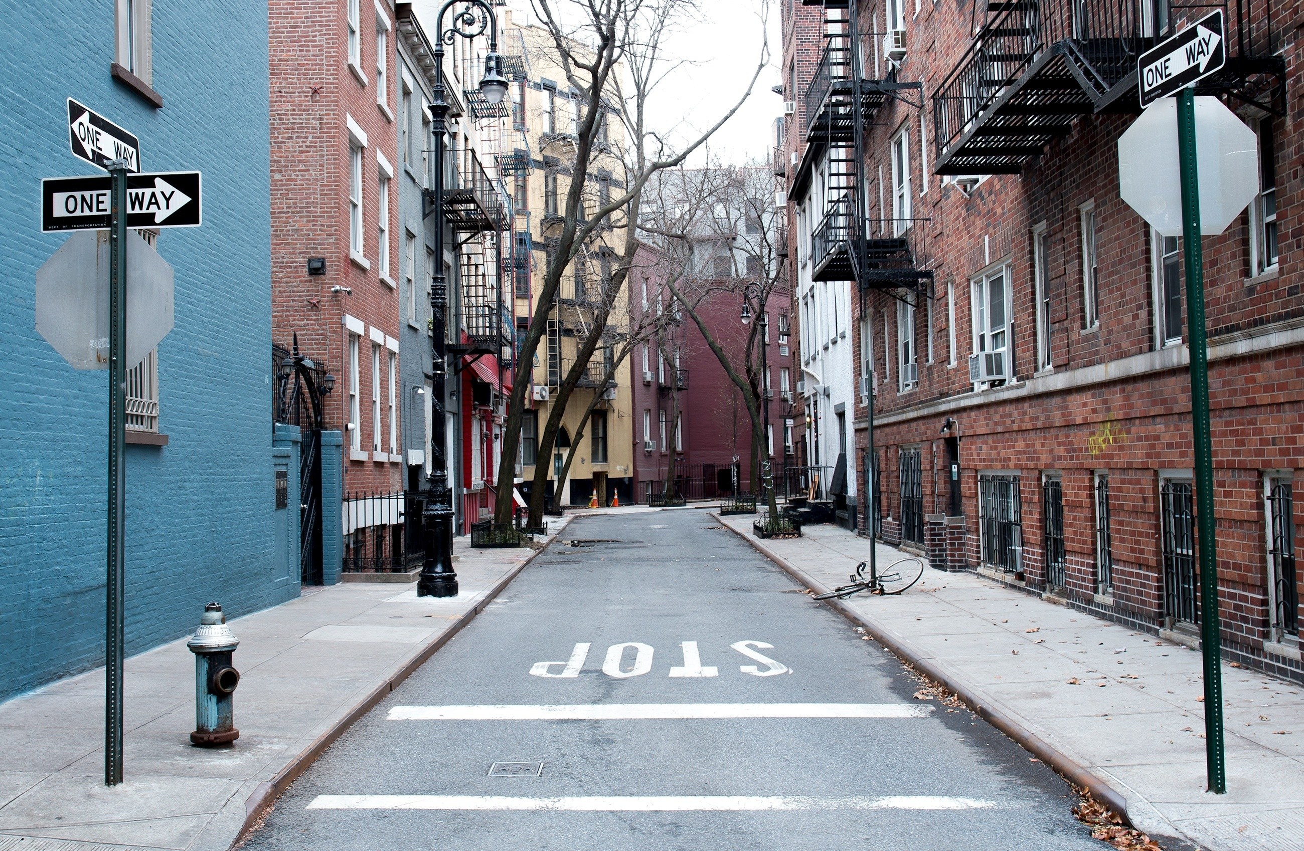 Empty city street with stop sign