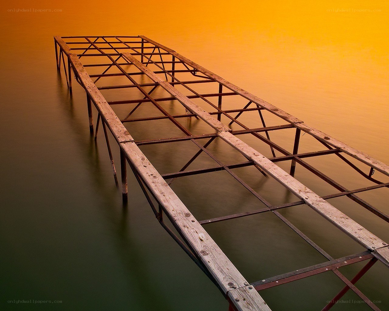 Empty dock at sunset