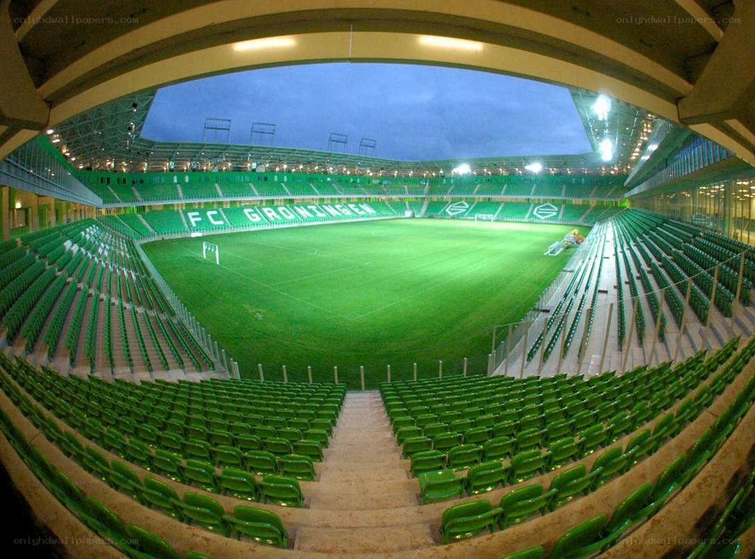 empty football stadium at dusk