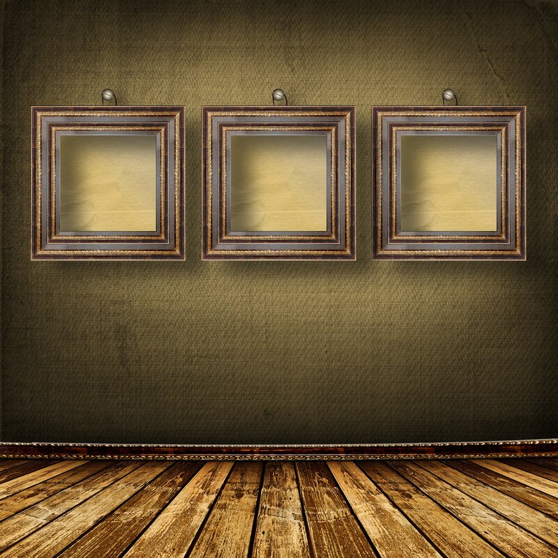 Empty frames on gallery wall