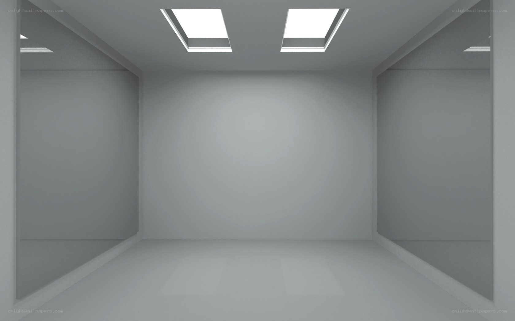 empty gray room with skylights