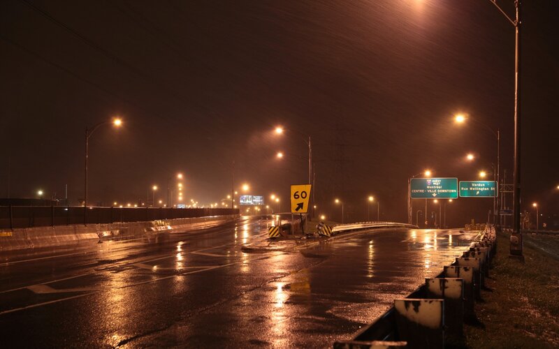 Empty highway at night in rain