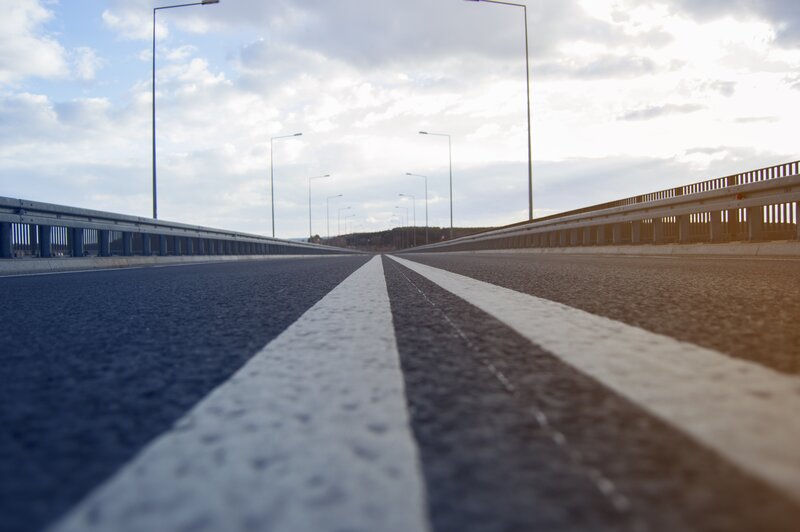 Empty Highway at Sunset — Gray