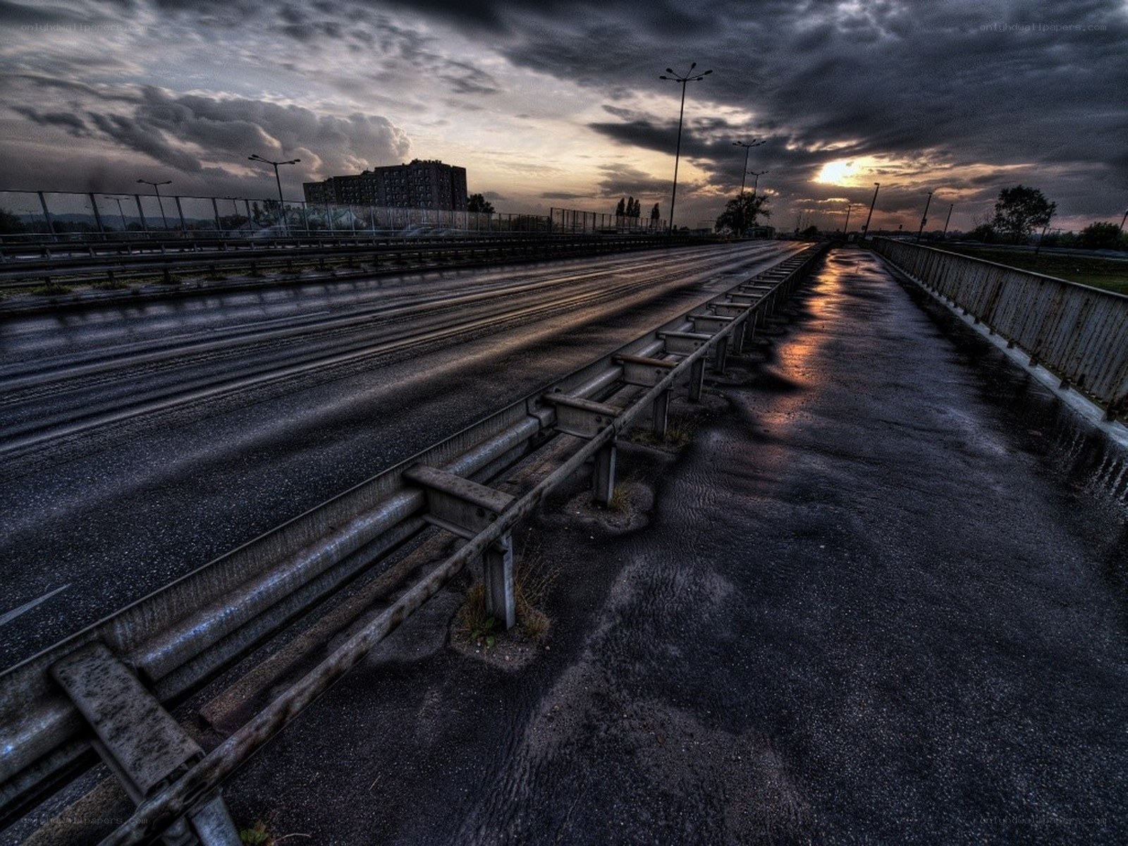 Empty highway at sunset