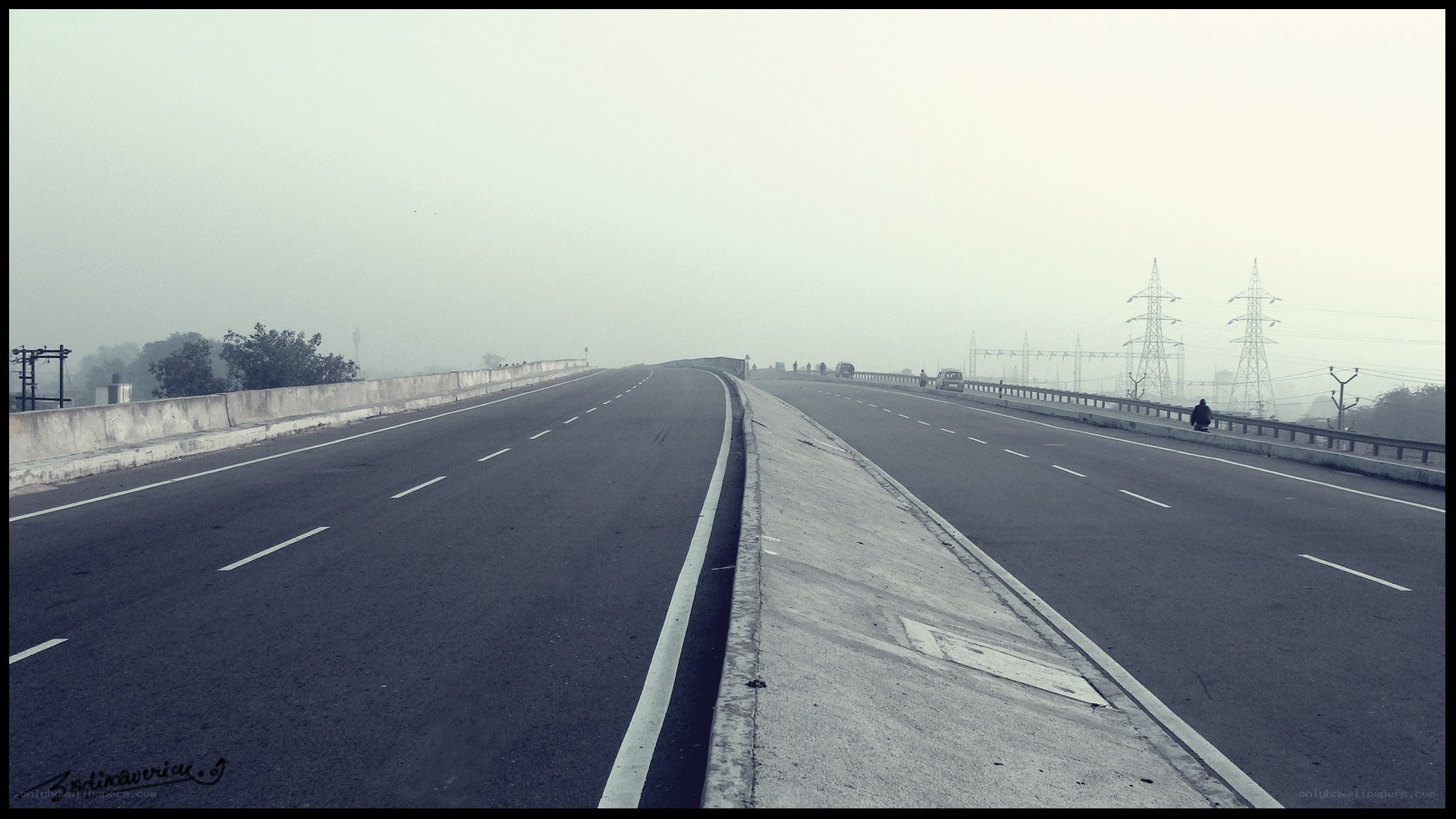 Empty highway in foggy weather
