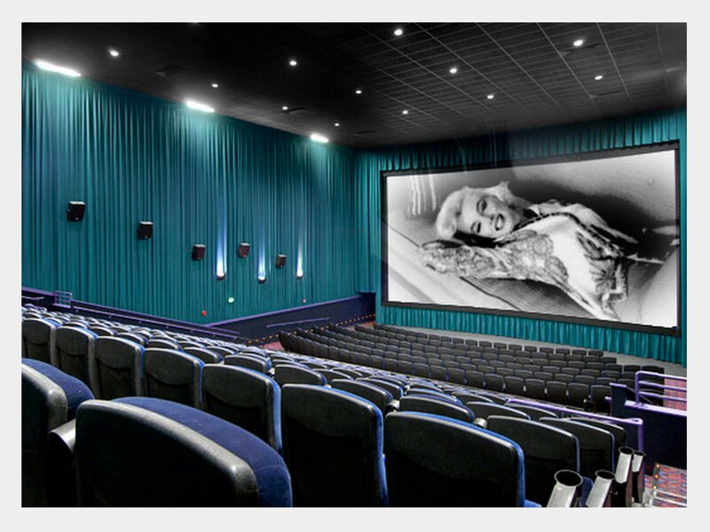 Empty movie theater with screen