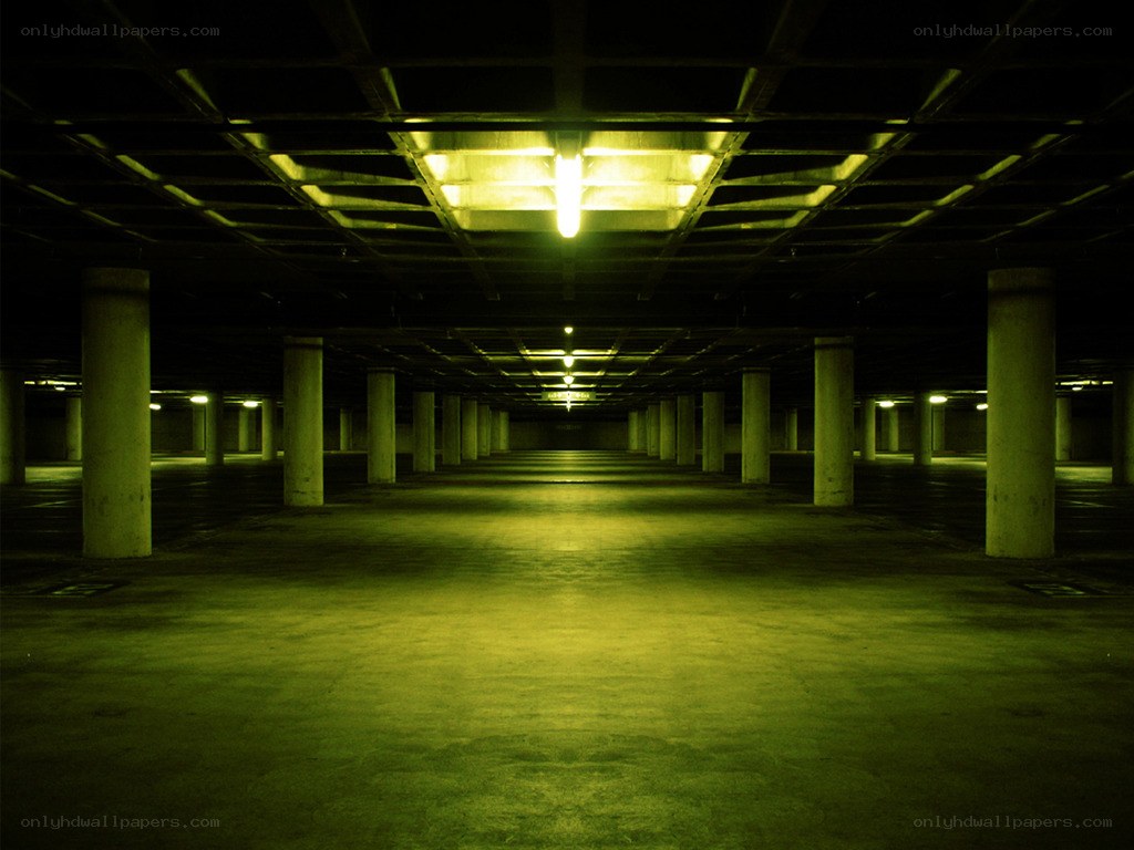 Empty parking garage at night