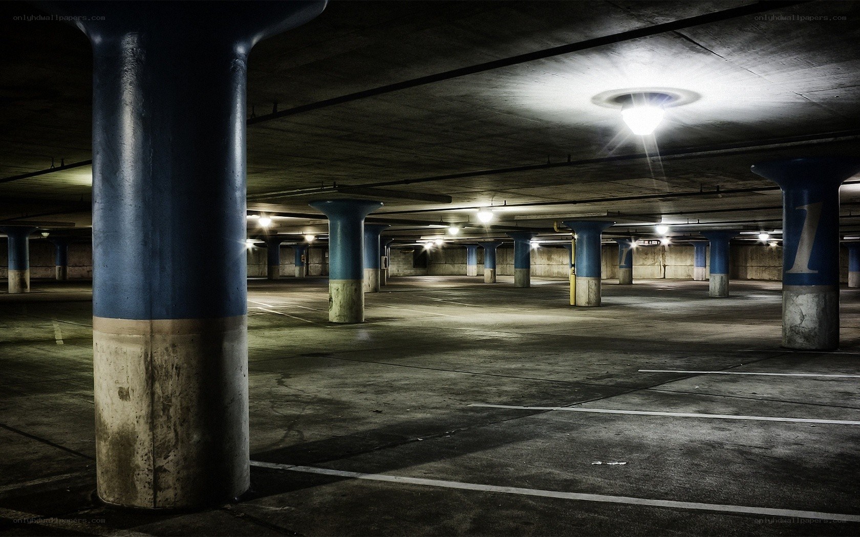 Empty parking garage at night