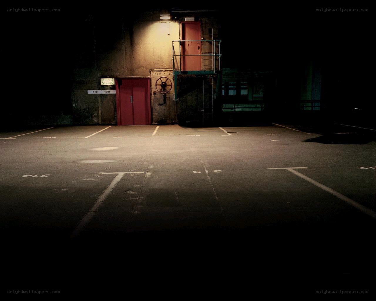 Empty parking garage at night