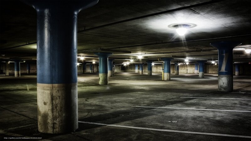 Empty parking garage at night
