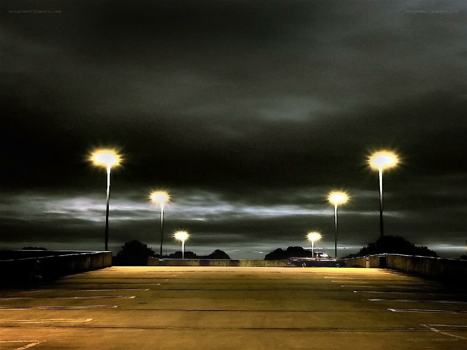 Empty parking lot at night