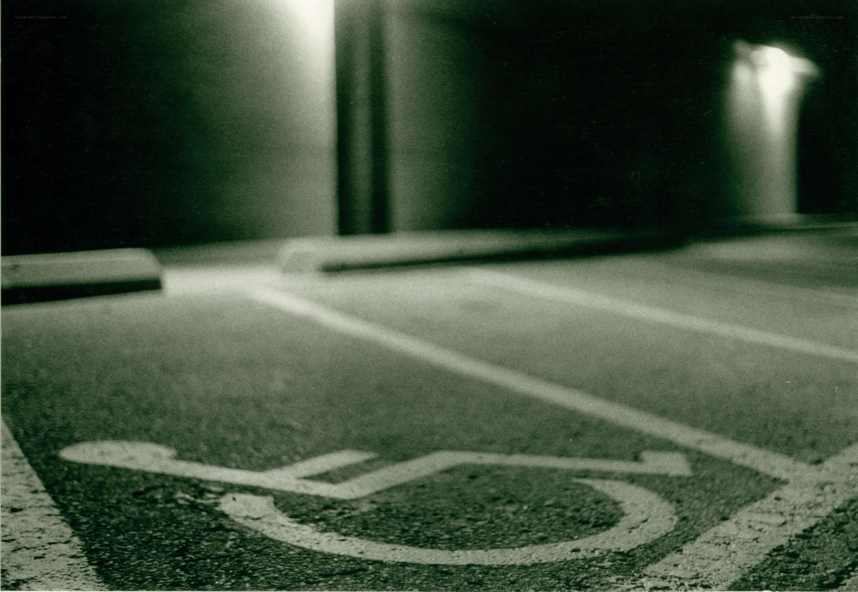 Empty parking spot with handicap symbol