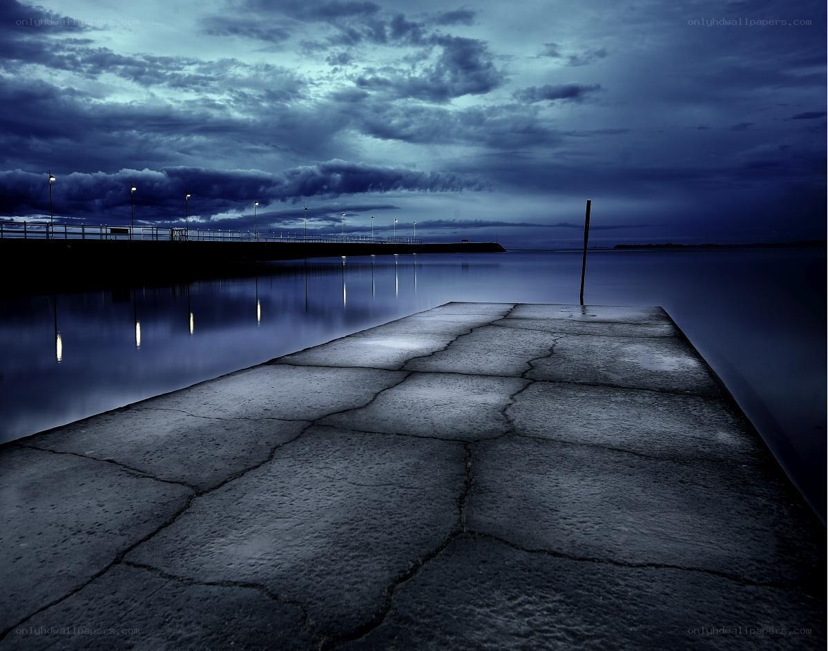 Empty pier at dusk