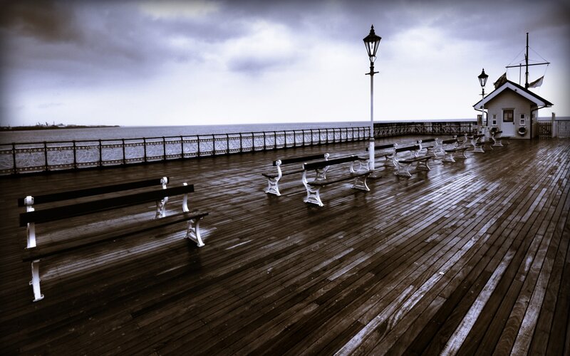 Empty Pier at Sea — Brown
