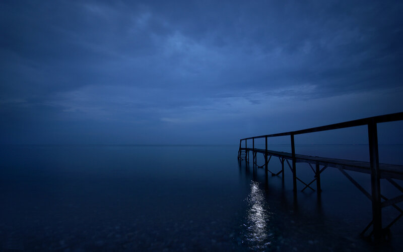 Empty pier at twilight