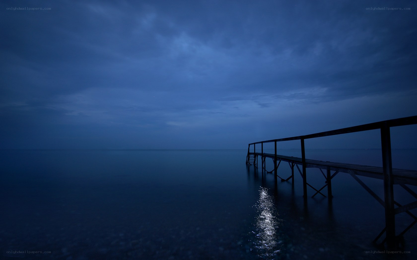 Empty pier at twilight