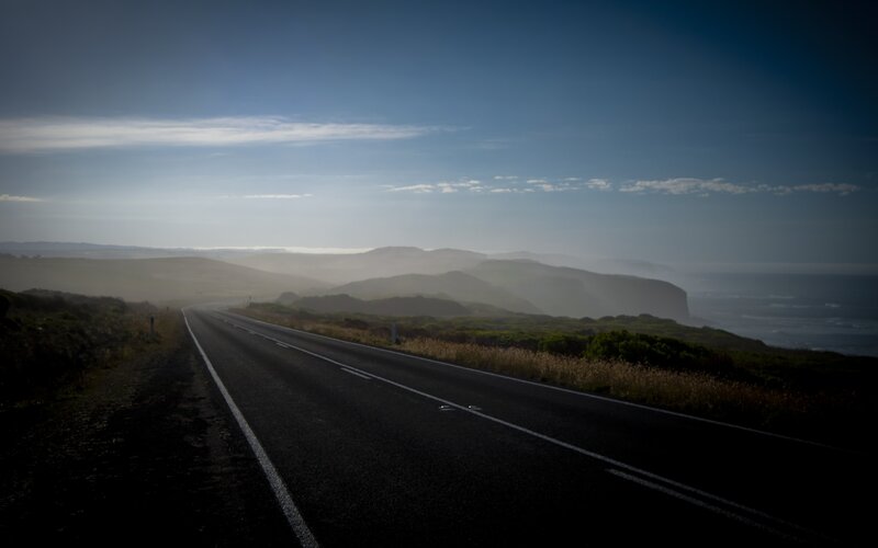 Empty Road Along Coast