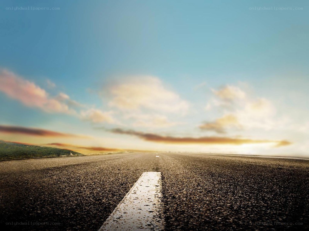 Empty road at sunrise