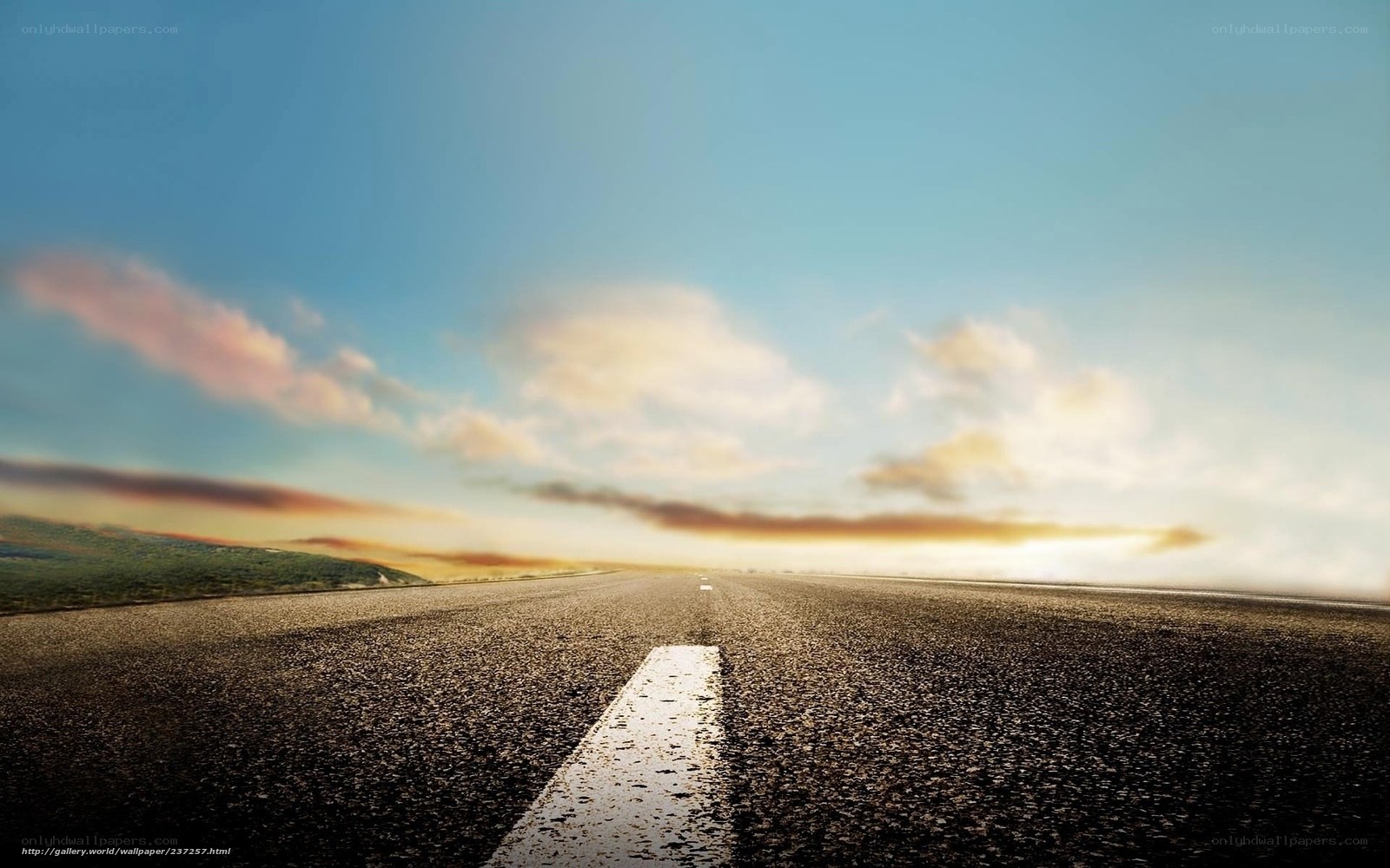 Empty road at sunrise