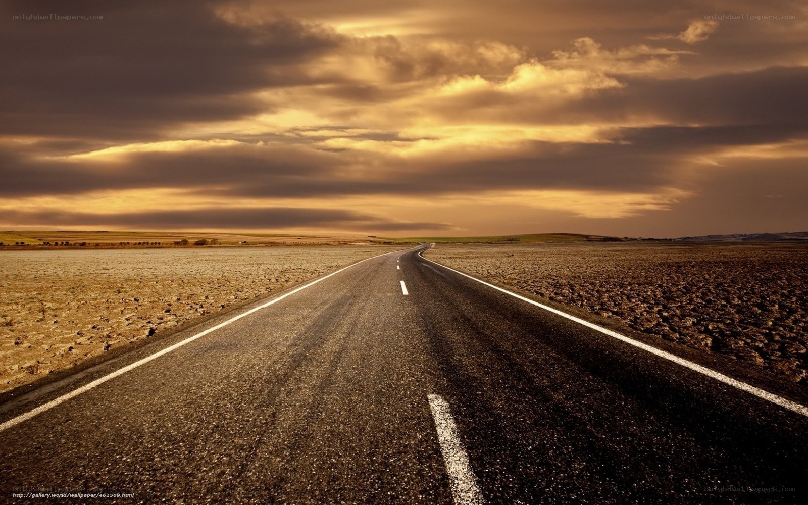 Empty road at sunset