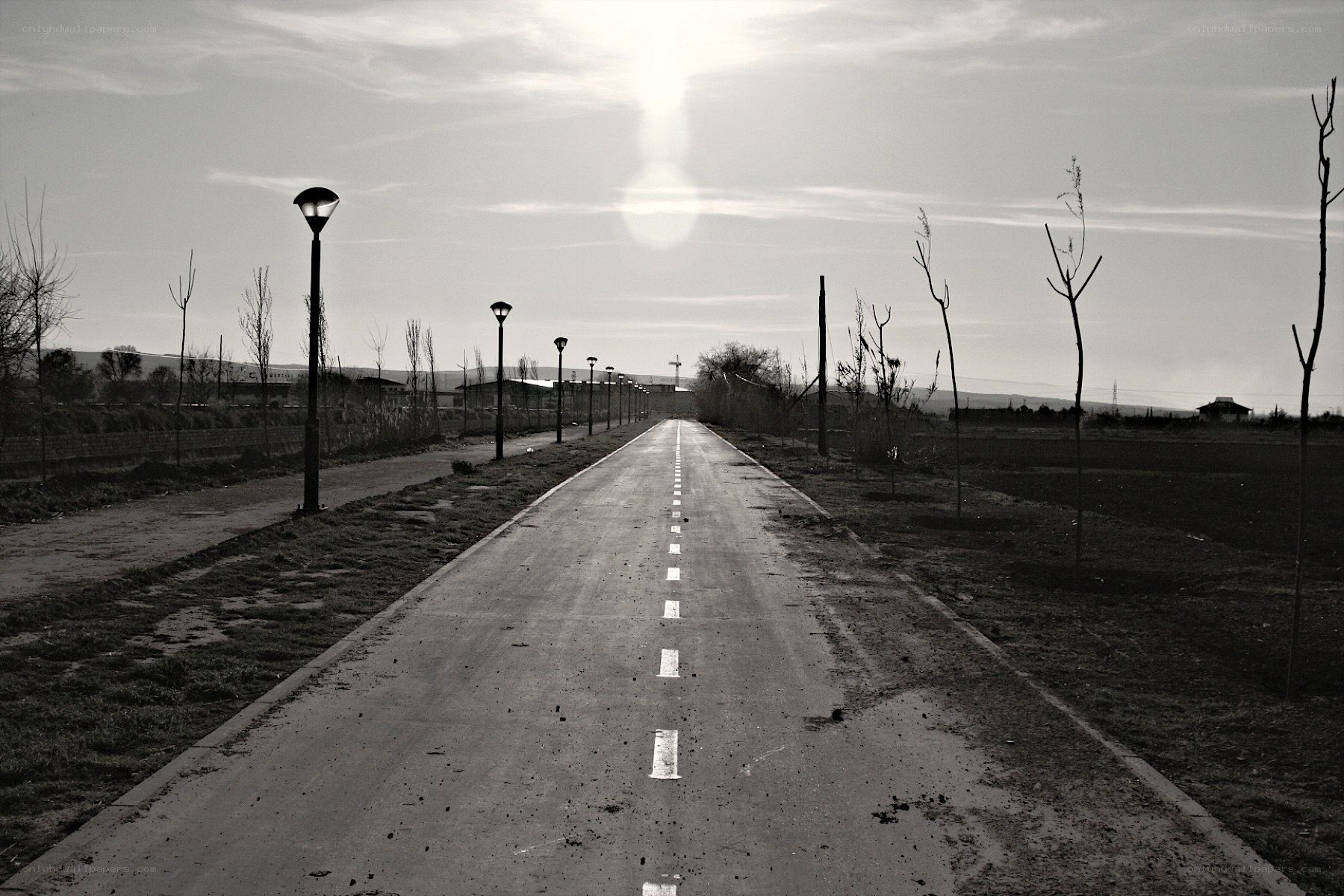 Empty road at sunset