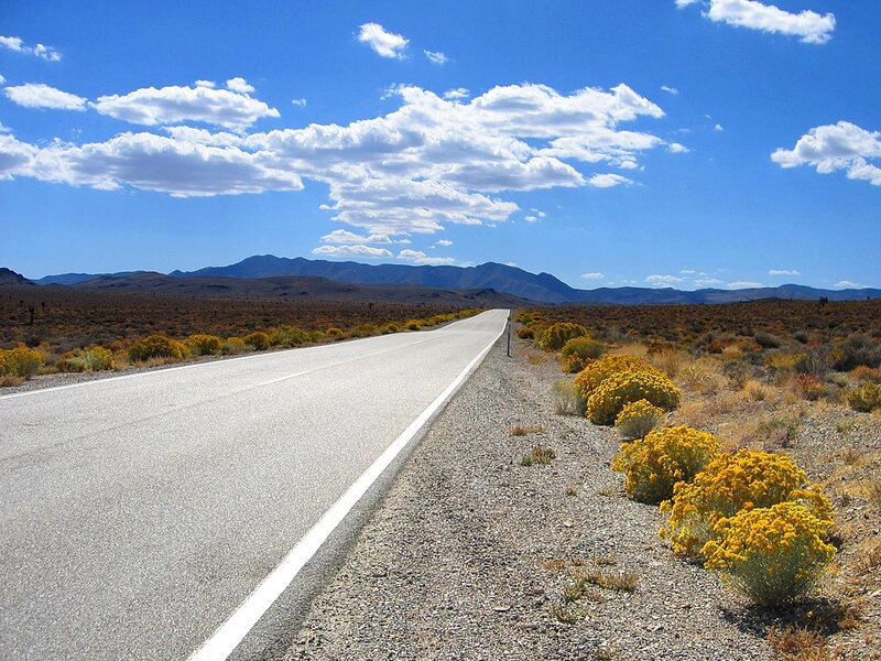 Empty Road in Desert — Blue, Serene, Afternoon, Photograph, Mountains, Clouds, Bushes