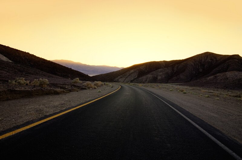 Empty Road in Desert — Yellow, Serene, Sunset, Photograph, Mountains, Sky, Black
