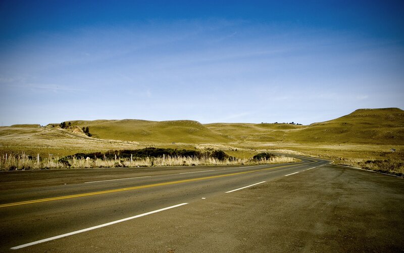 Empty Road in Hills — Blue, Serene, Afternoon