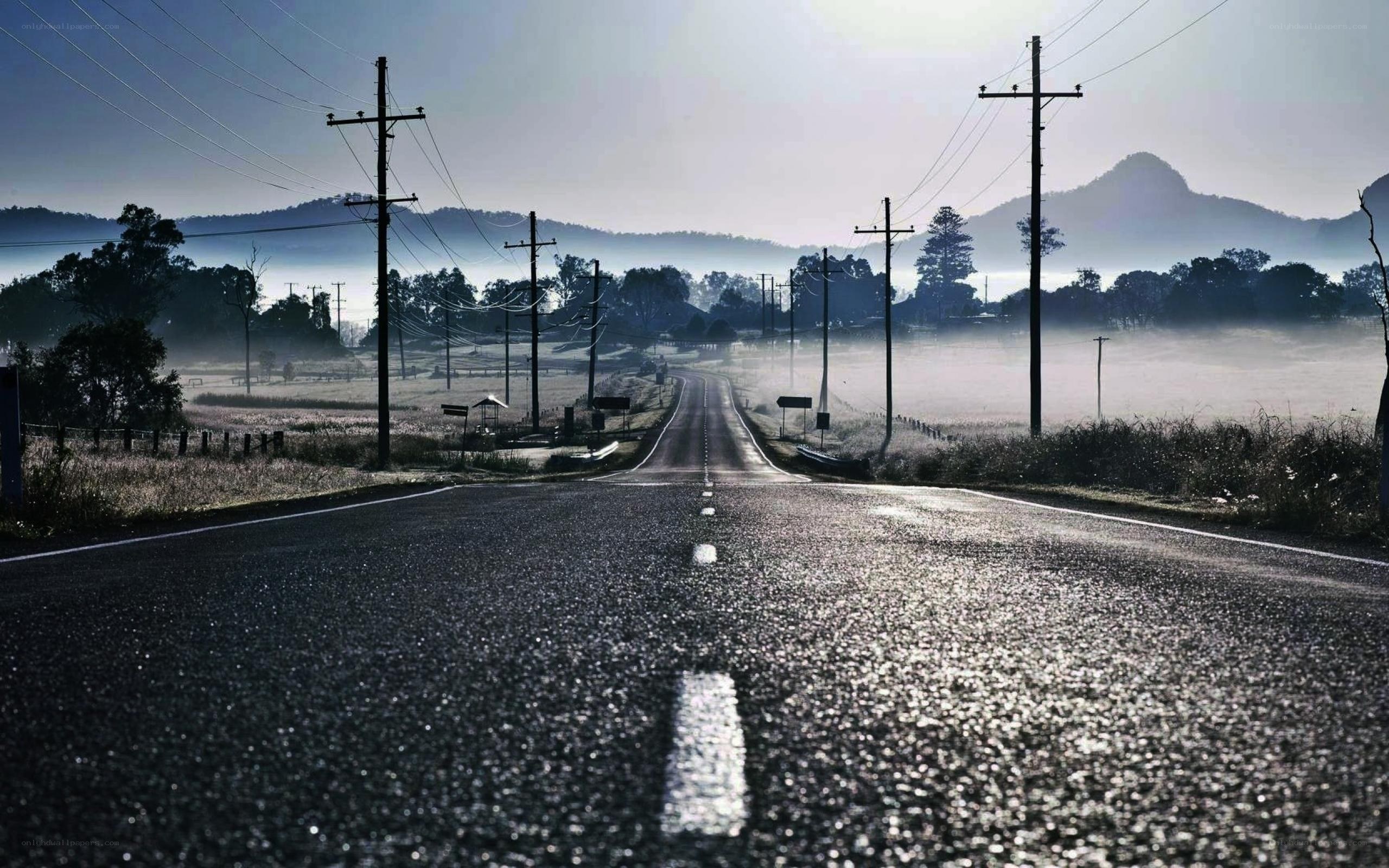 Empty road in misty morning