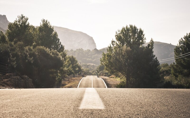Empty Road in Mountains — Gray