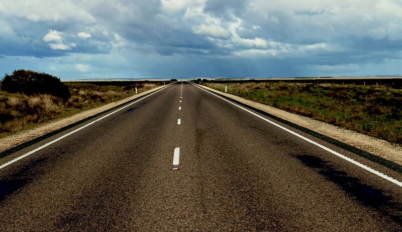 Empty Road Stretching Forward — Gray