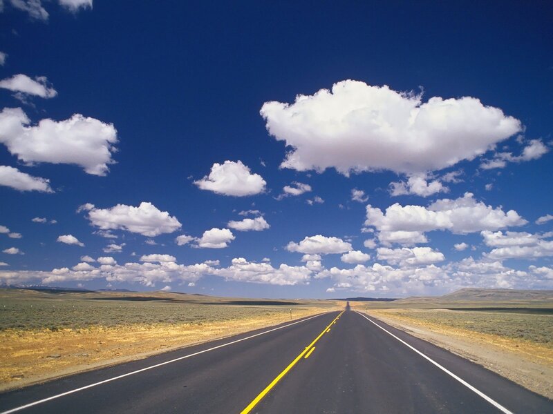 Empty Road under Clouds