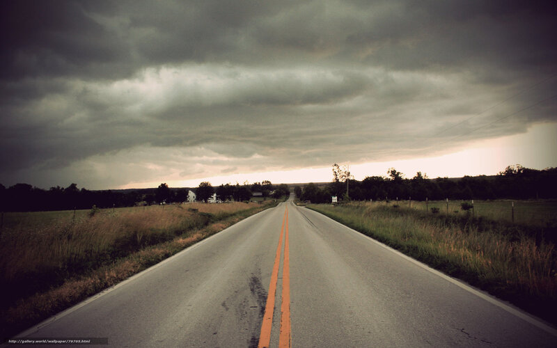 Empty Road under Storm Clouds
