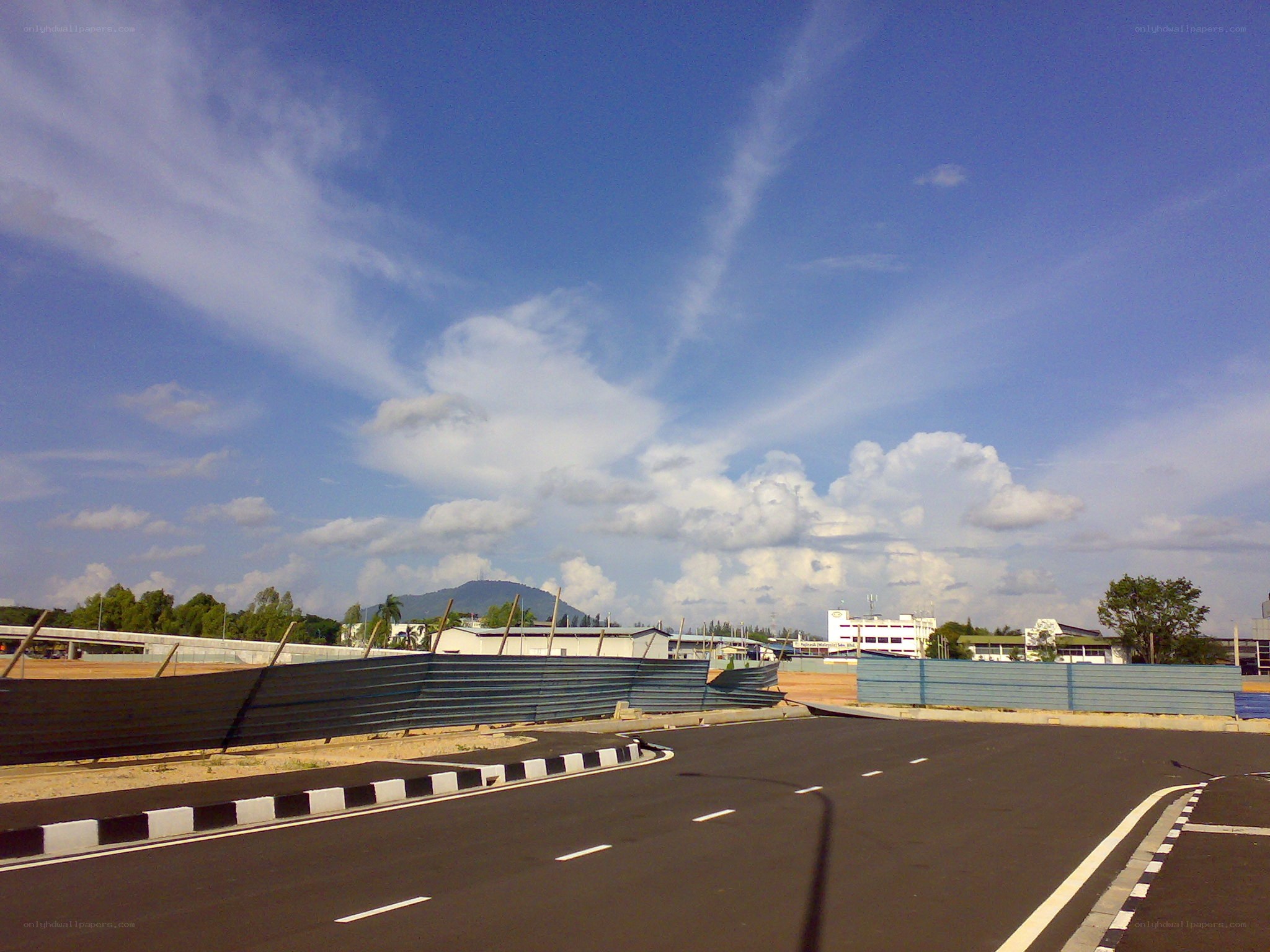 Empty road with blue sky
