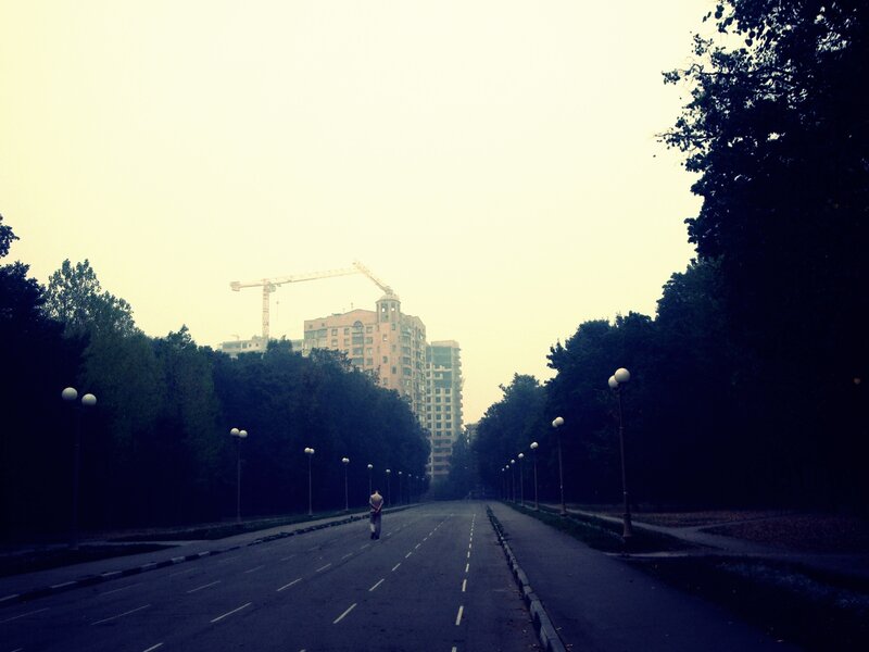 Empty road with construction in distance