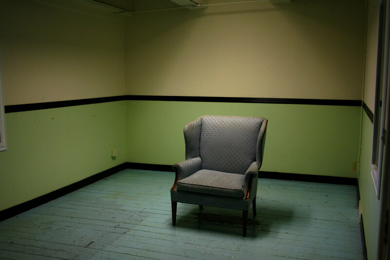 empty room with armchair