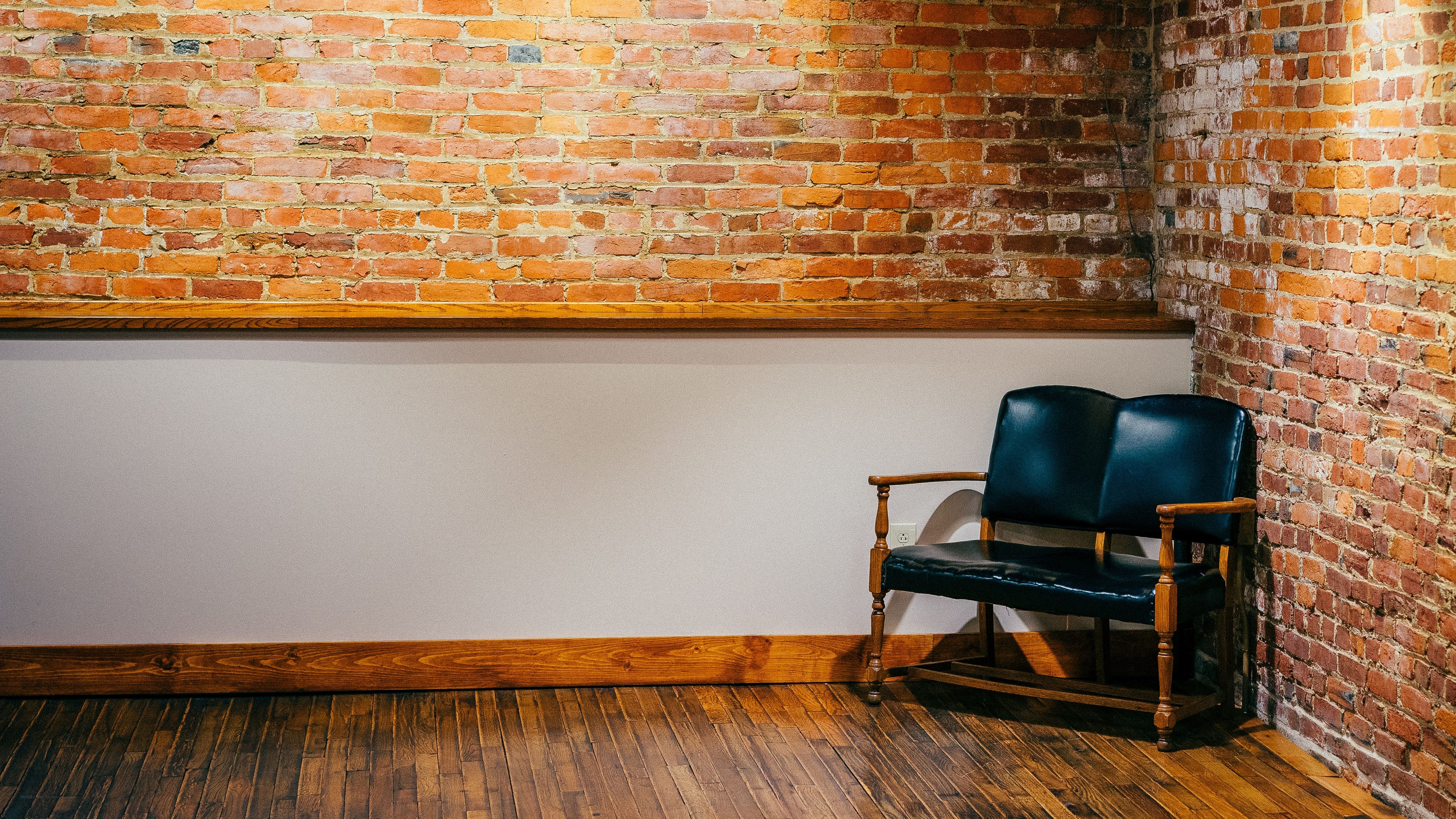 Empty room with brick wall