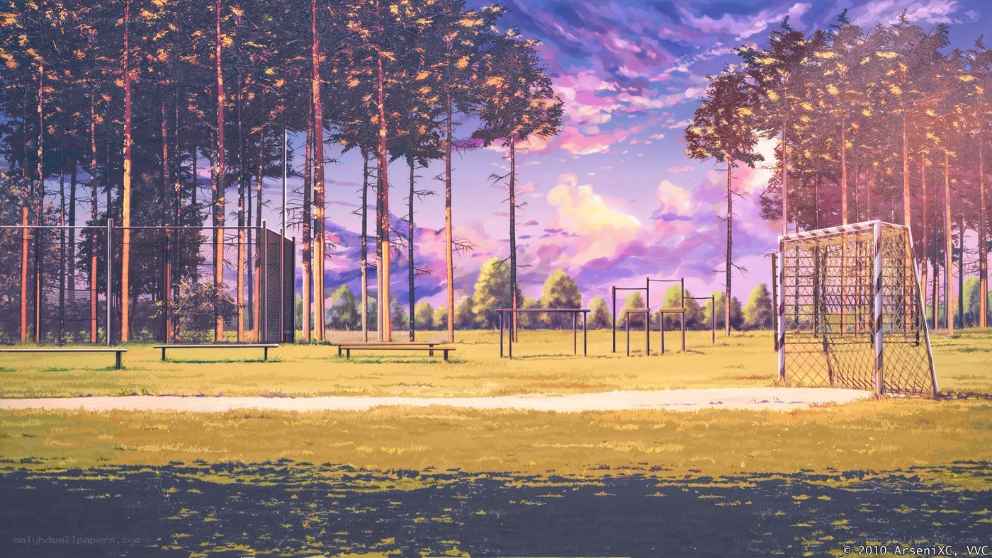 Empty sports field at sunset
