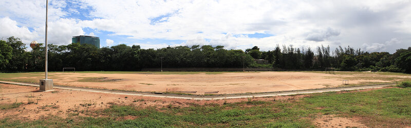 empty sports field with city view